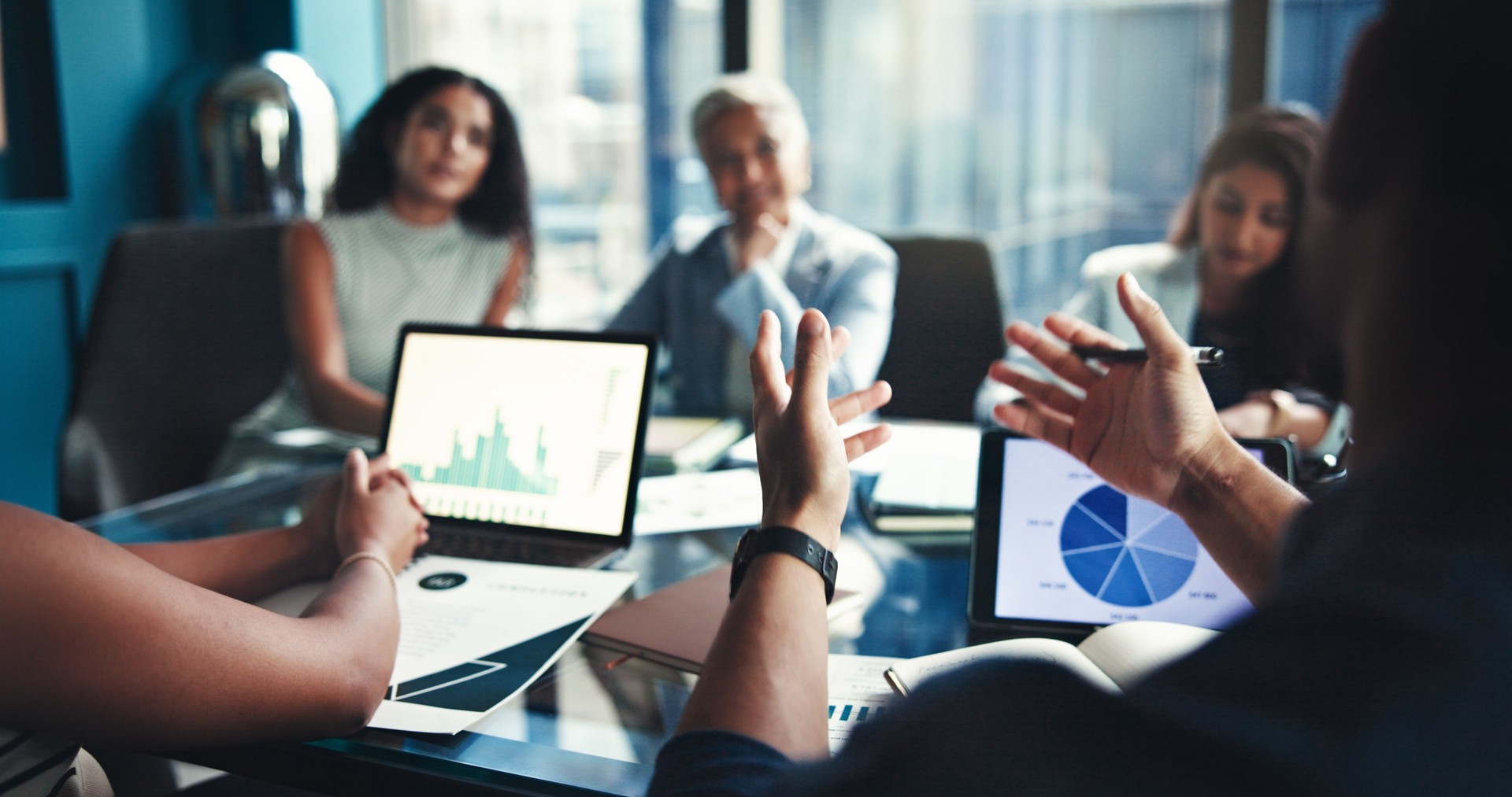 Finance, hands and tablet screen with business people in office boardroom for investment opportunity. Growth, portfolio and presentation with financial team in workplace for wealth management